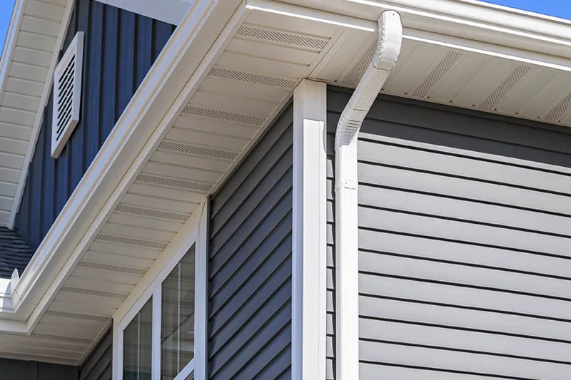 New home with white gutters, soffit and fascia